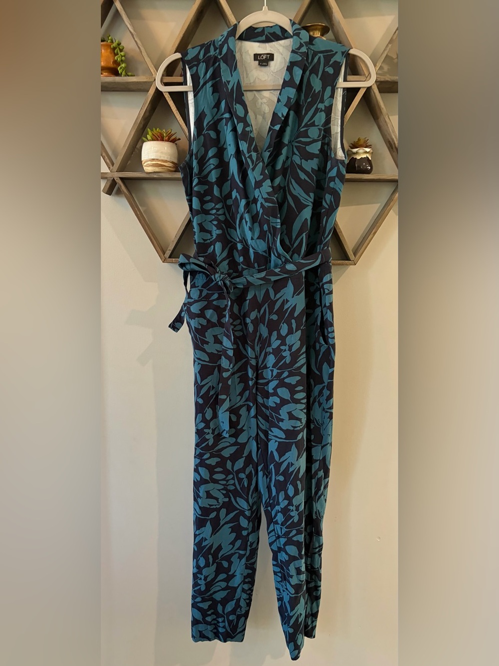 Loft sleeveless blue floral print wrap jumpsuit tie waist. Size 6.